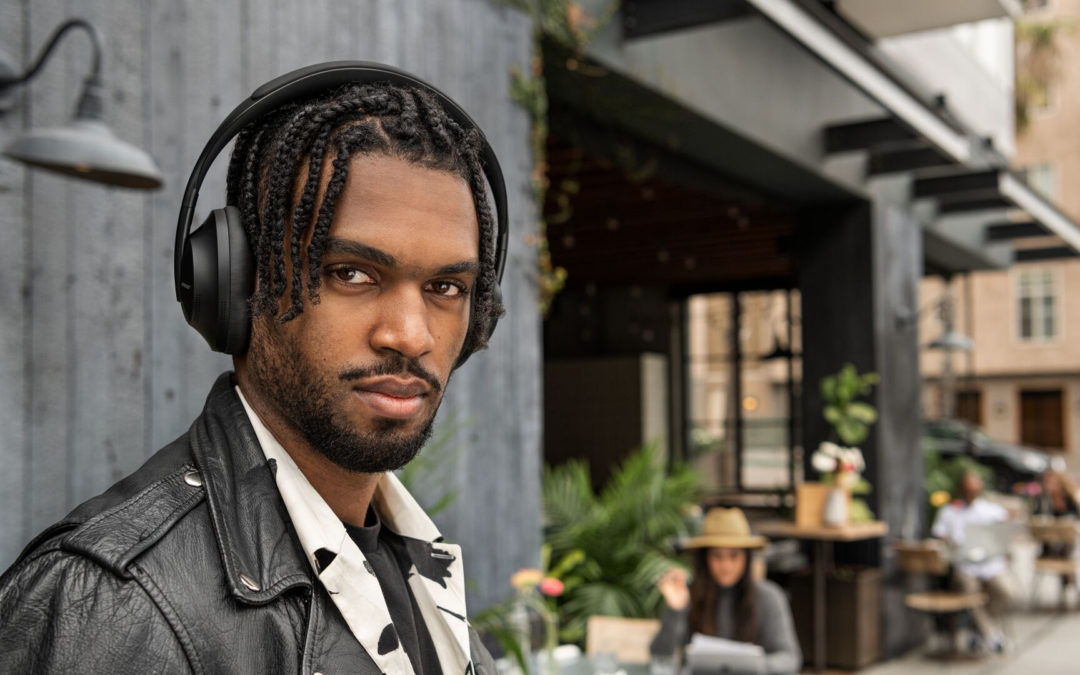 Man wearing Bose noise isolating headphones